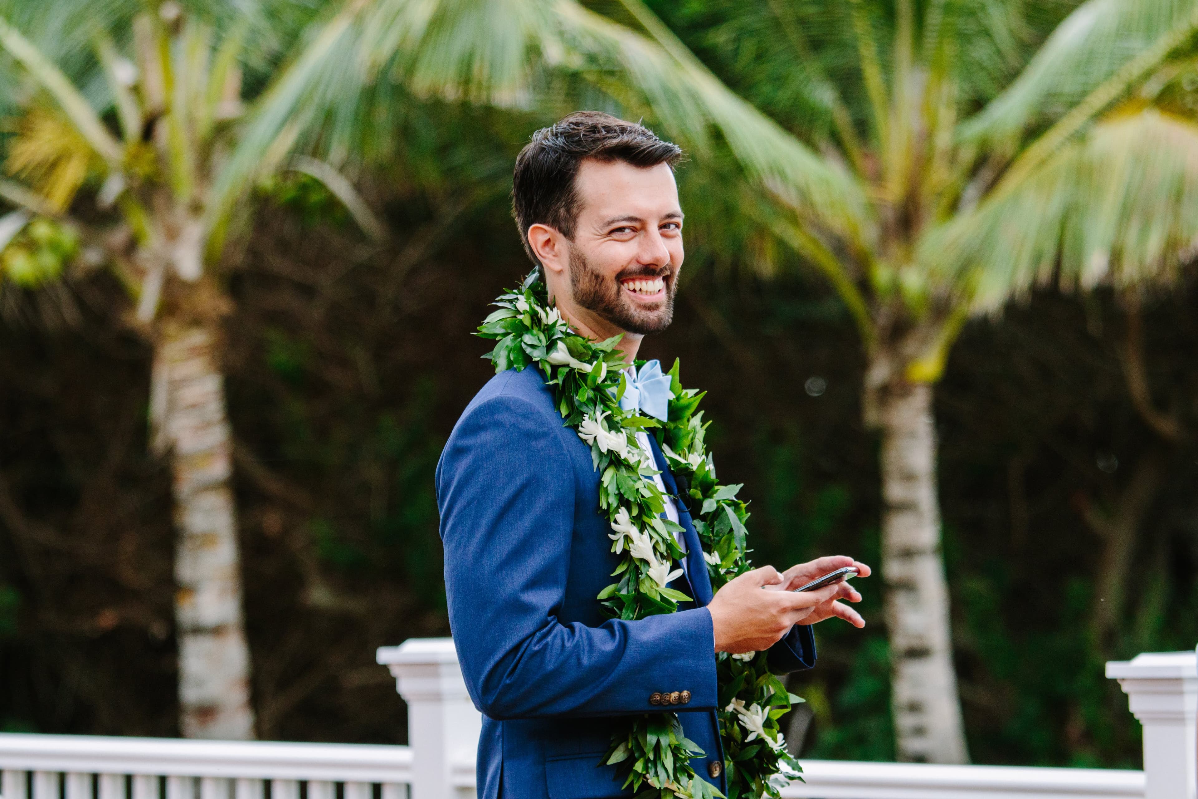 Beau Sumile, smiling in a lei in Honolulu